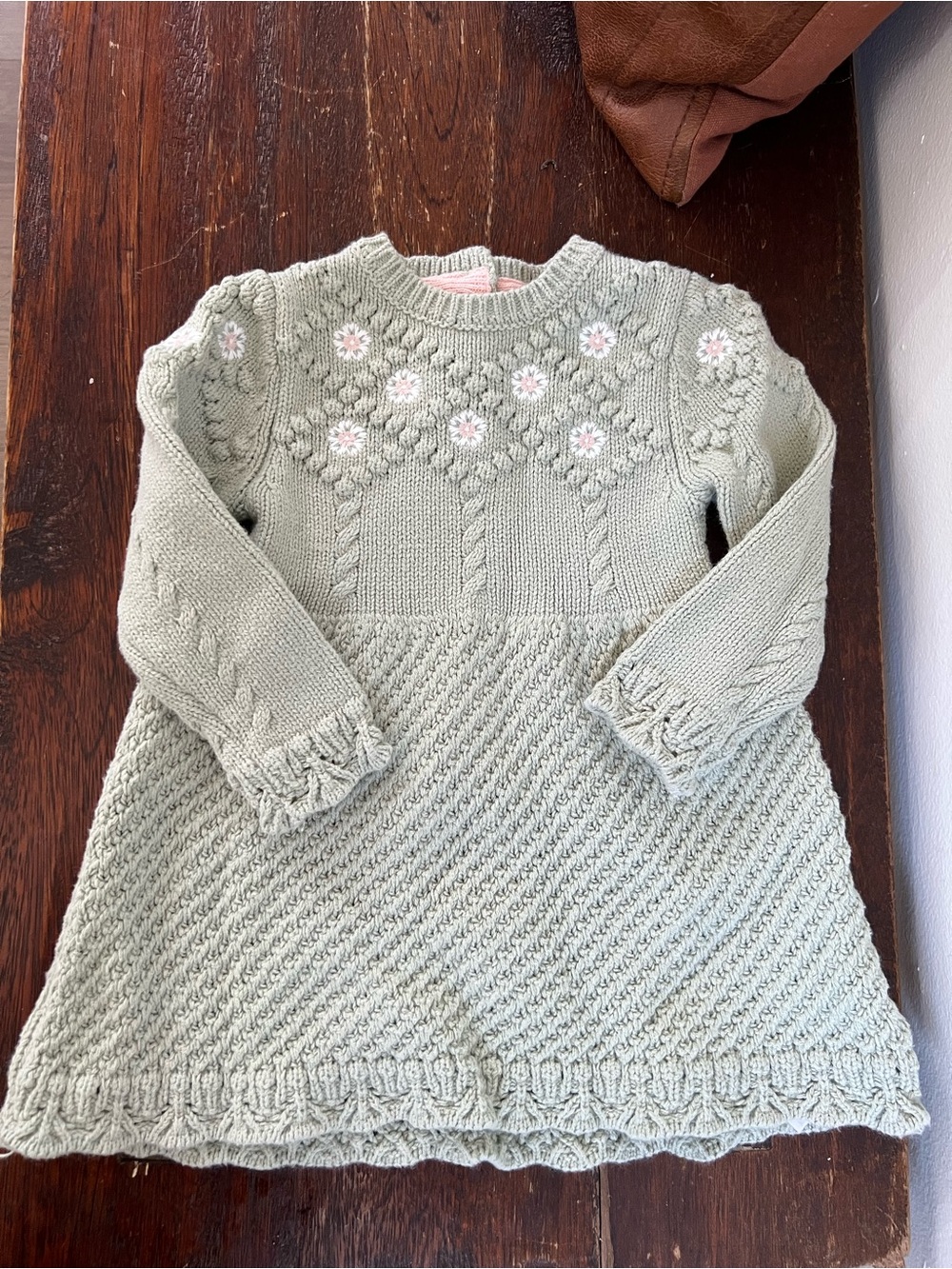 cupcakes & cashmere sage knit baby sweater with pink floral trim